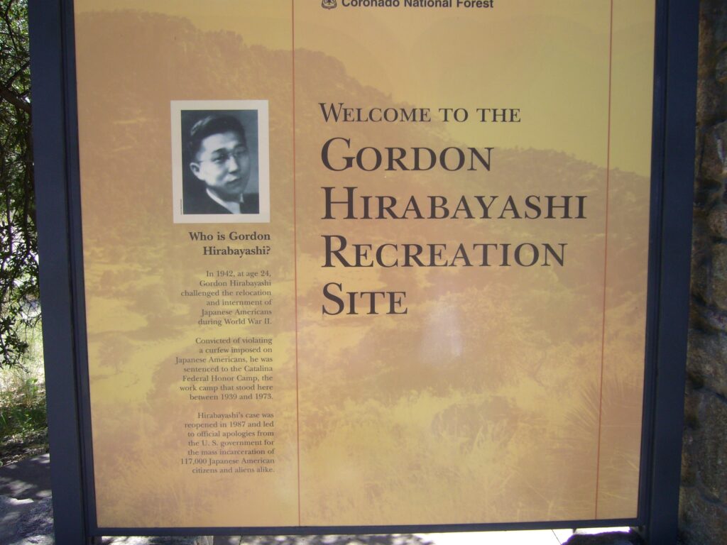 A sign depicting Gordon Hirabayashi.